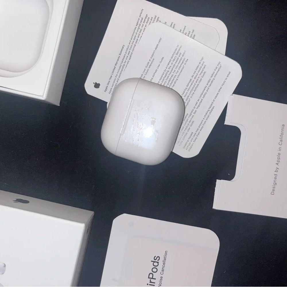 AirPods with charger barely used